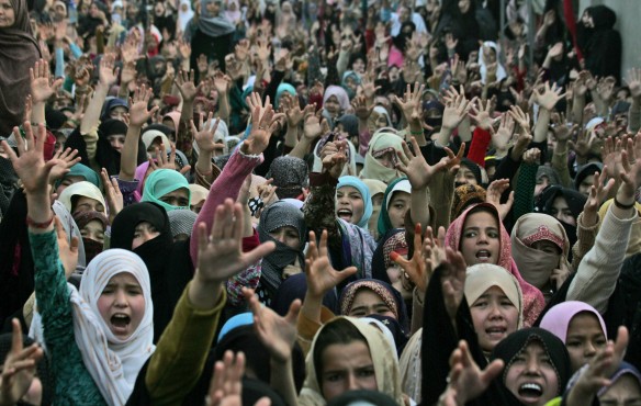 Pakistani Shiite Muslim women shout slogans during a protest to condemn Saturday's bombing in Quetta, Pakistan, Sunday, Feb. 17, 2013. Angry residents on Sunday demanded government protection from an onslaught of attacks against Shiite Muslims, a day after scores of people were killed in a massive bombing that a local official said was a sign that security agencies were too scared to do their jobs. (AP Photo/Arshad Butt)